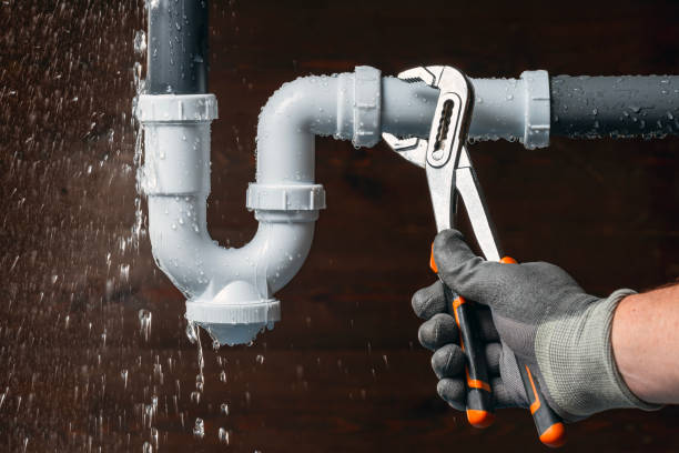 Professional Emergency Plumber technician working in Okauchee, WI